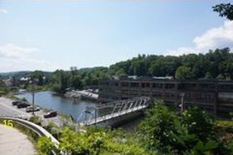 The building from across the Black River